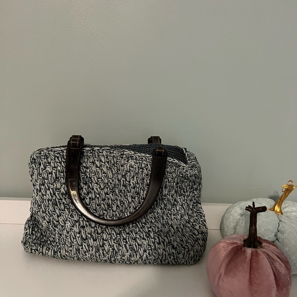 Liz Claiborne Woven Purse. Bluish Green color. Has thick plastic handles.